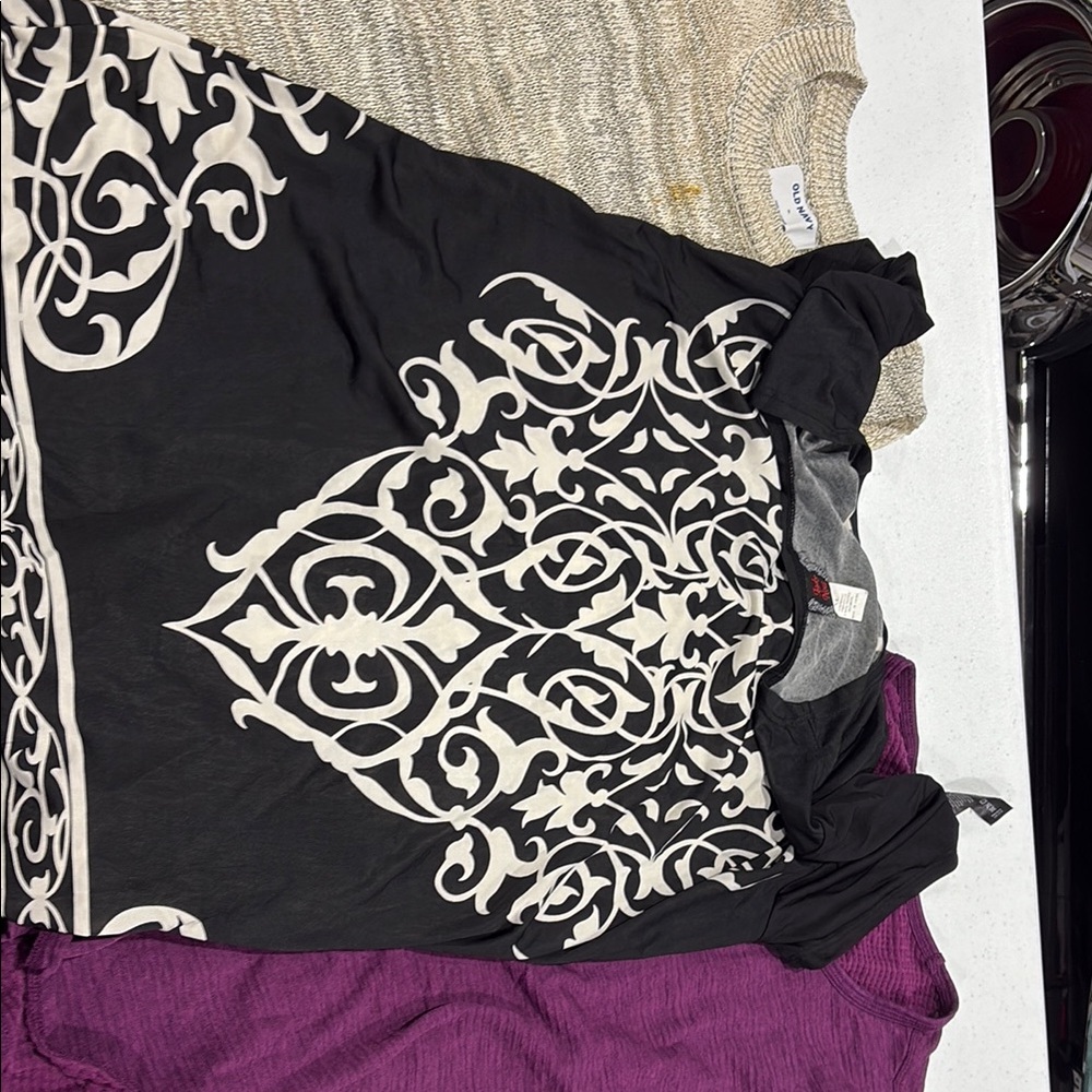Elegant Black Dress with Intricate White Pattern